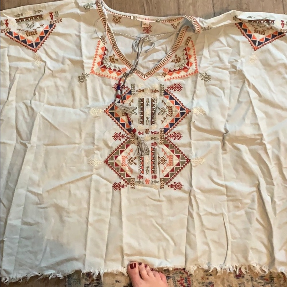 Aztec/tribal top with blue background